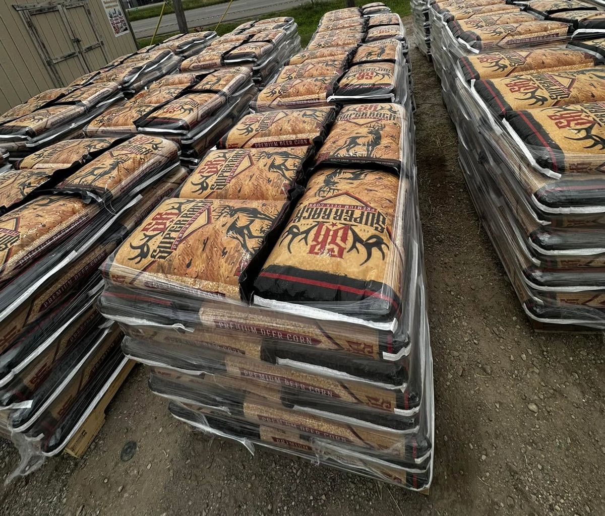 Pallets of SuperRack Premium Deer Corn outside the store