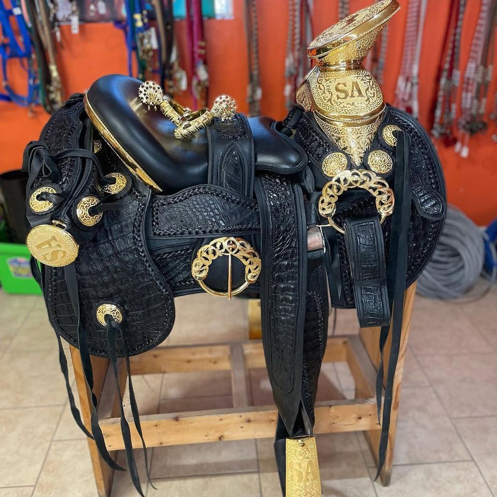 Black gator-leather charro saddle with gold hardware
